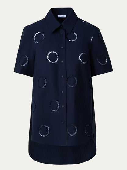 An Akris Punto Circle Eyelet Embroidery Short Sleeve Blouse in Navy cotton popeline.