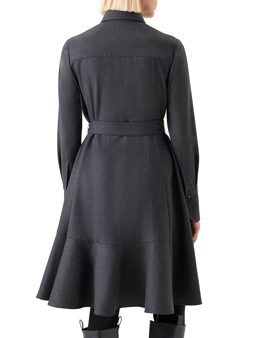 A person seen from the back wears the Akris Punto Flannel Wool Belted Shirtdress in Charcoal, featuring long sleeves, a fit-and-flare silhouette, and a flared hem.
