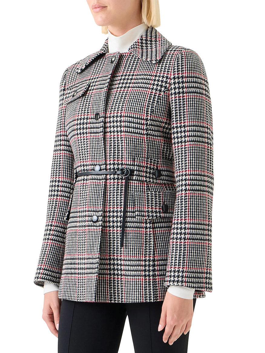 A woman wears the Akris Punto Glencheck Wool-Blend Jacket in Black/Cream/Vermillion, styled over a white turtleneck and black pants.