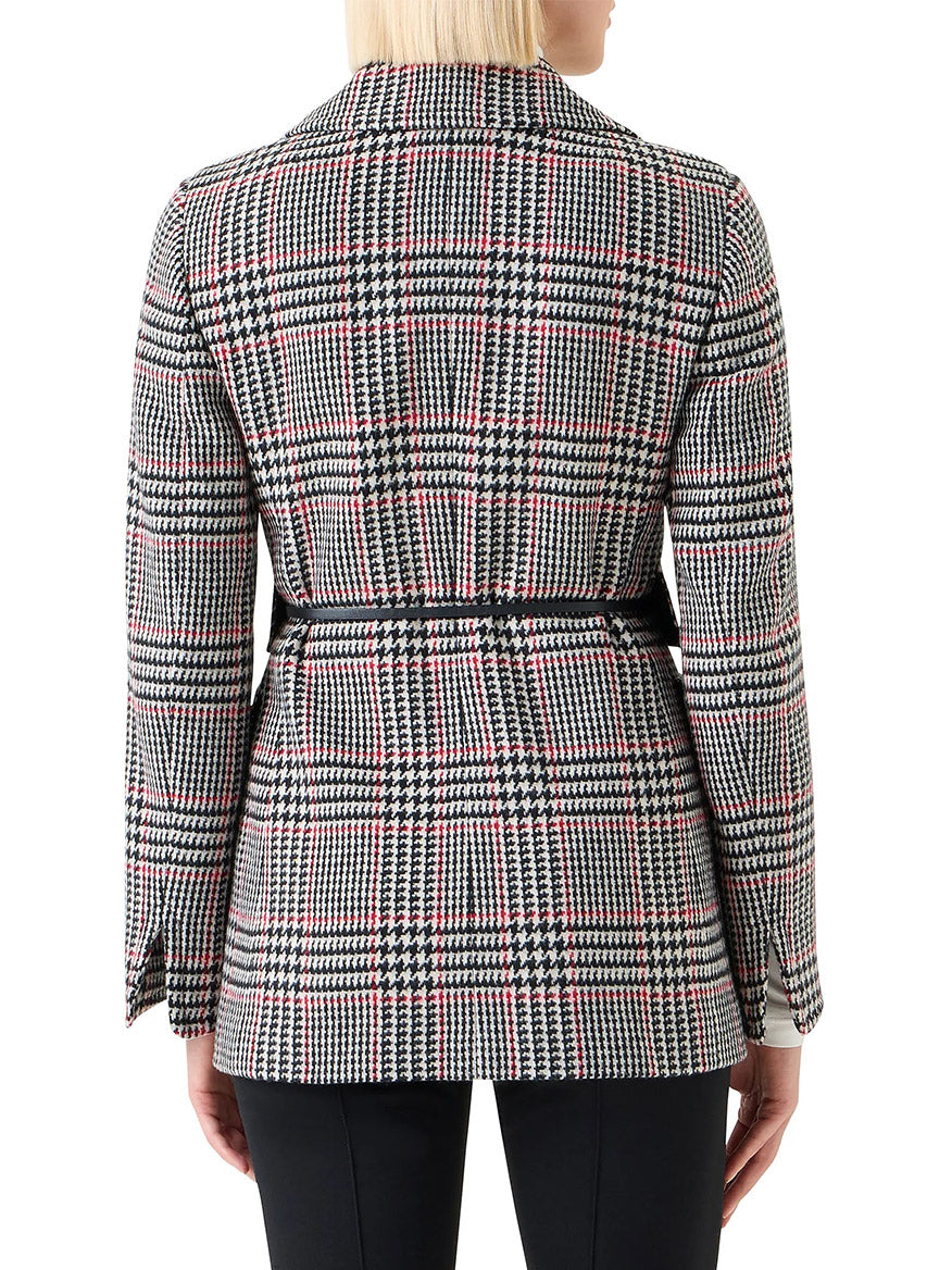 A person with blonde hair, seen from behind, wears the Akris Punto Glencheck Wool-Blend Jacket in Black/Cream/Vermillion paired with black pants.