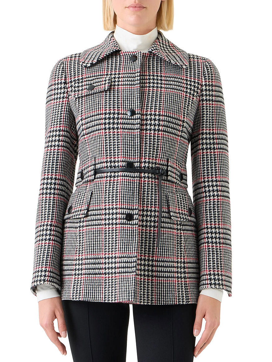 A person wearing the Akris Punto Glencheck Wool-Blend Jacket in Black/Cream/Vermillion, styled with a leather belt, stands against a white background.