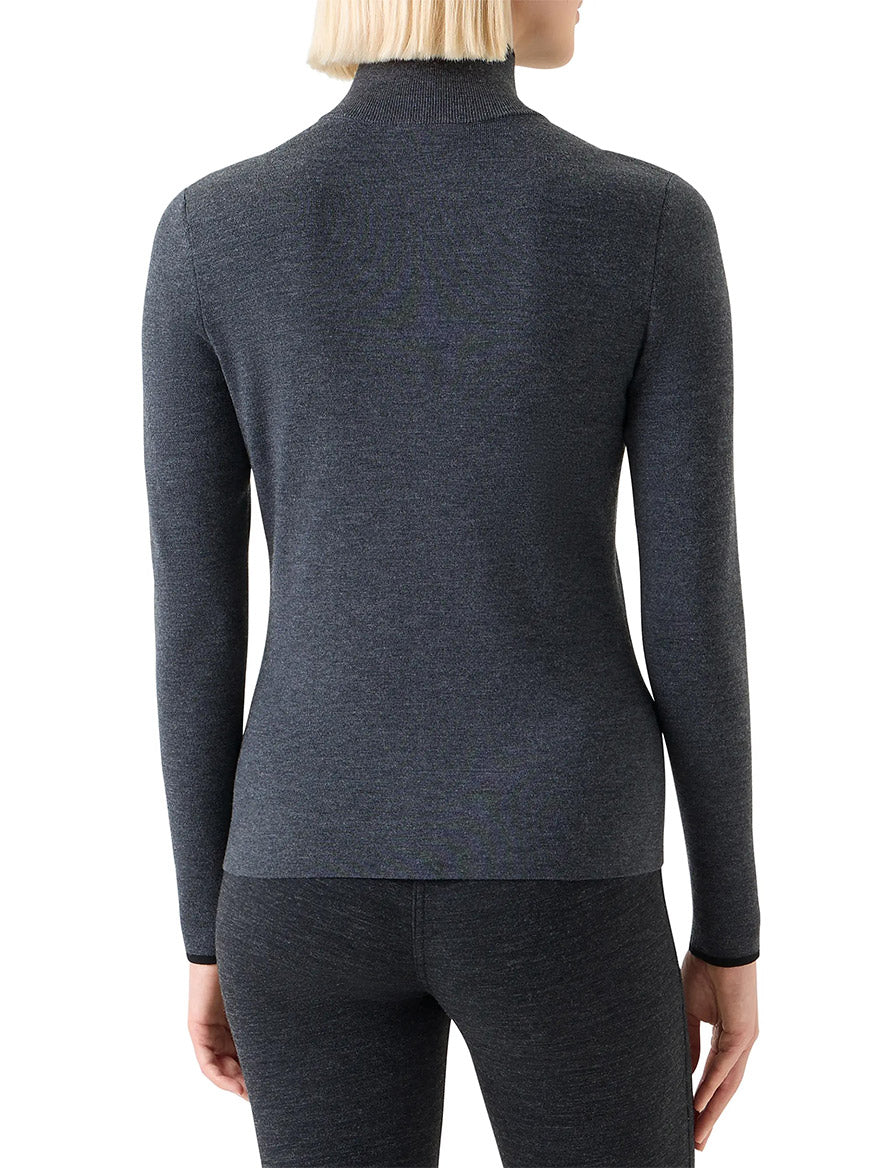 A person with short blonde hair is shown from the back, wearing a fitted Akris Punto Virgin Wool Knit Zip Cardigan in Charcoal/Black.