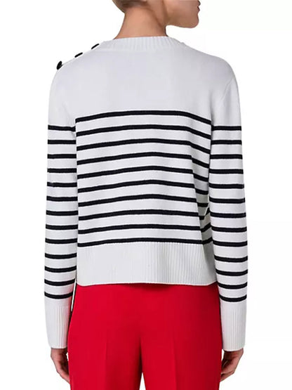 A woman wearing an Akris Punto Striped Crew Sweater With Snap Shoulder in Cream/Black cashmere blend sweater.
