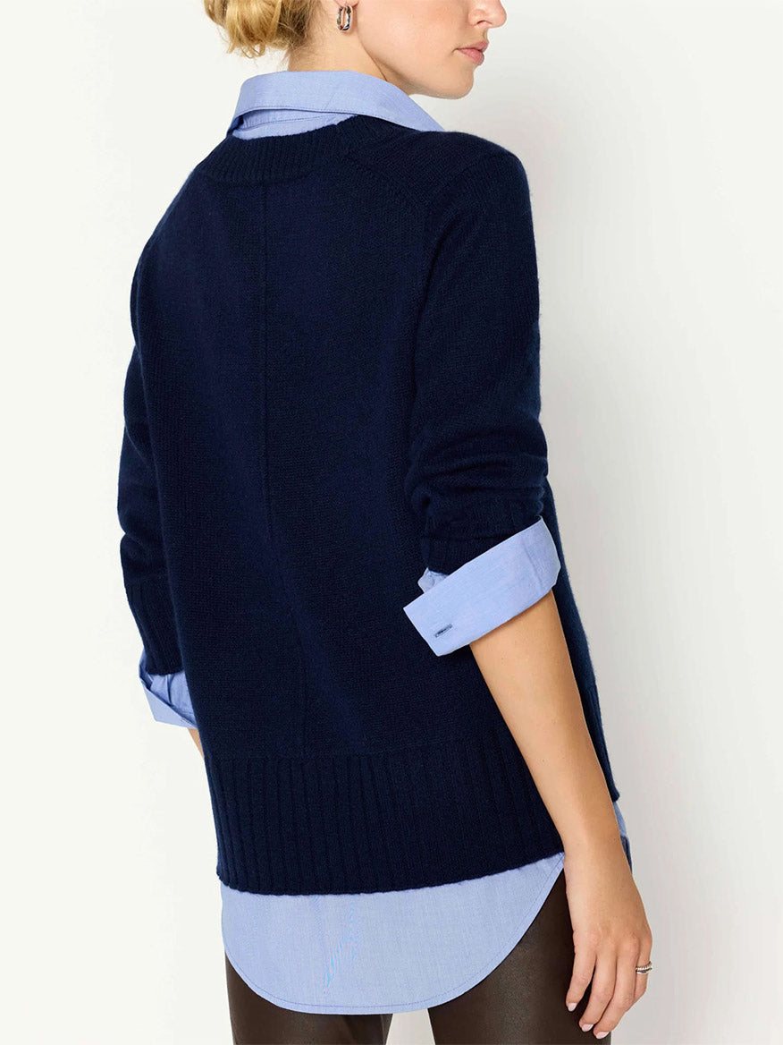 Woman wearing a Brochu Walker Arden Looker in Navy pre-layered sweater with a tailored fit, viewed from the back.