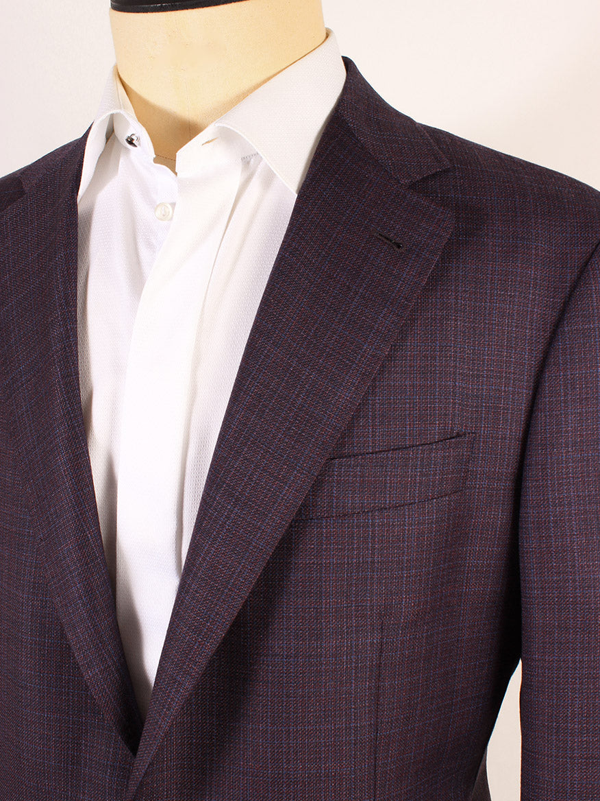 Close-up of a mannequin dressed in a Canali Kei Patch Pocket Sport Jacket in Plum and white shirt.