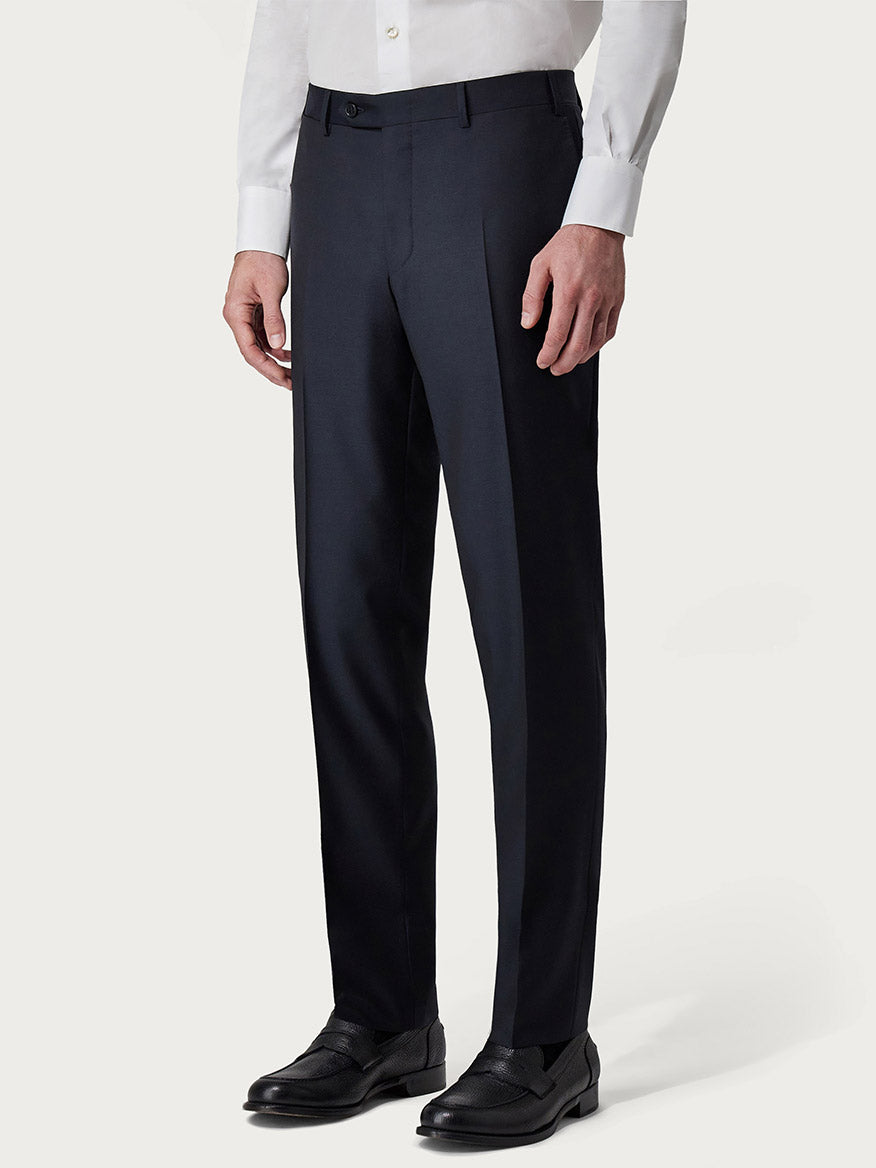 A man wearing a Canali Siena Contemporary Navy Blue Wool Suit, standing against a white background.