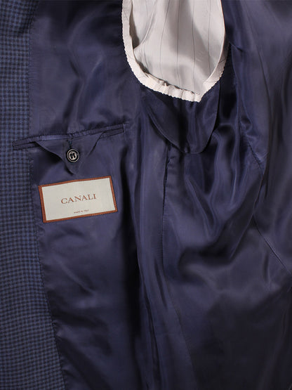 Close-up of a Canali Super 120s Wool Sport Jacket in Classic Blue Check brand label on the lining of a classic blue check sport jacket.