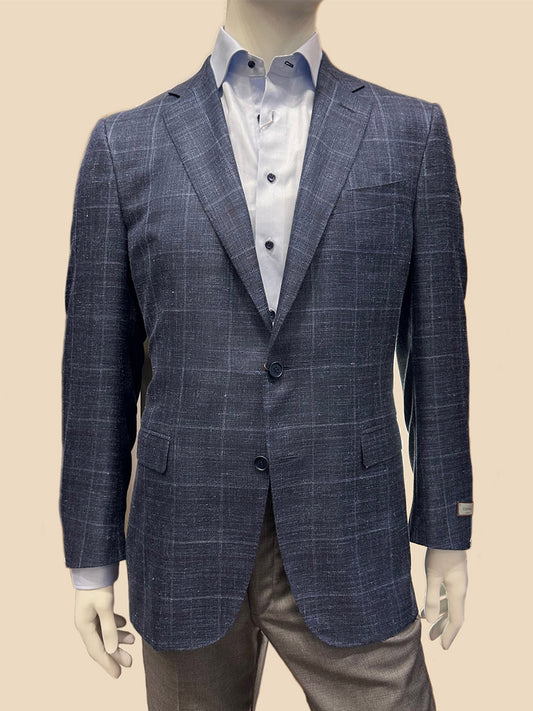 A mannequin showcases the Canali Flap Pocket Sport Jacket in Blue/White Plaid over a white dress shirt and gray trousers, set against a plain beige background.