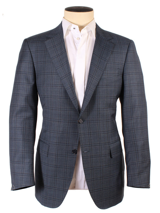 Canali Wool Sport Jacket in Blue Green Navy Plaid with notched lapels and a white shirt on a mannequin, displaying a sophisticated and formal attire.