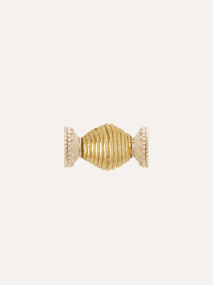 The Clara Williams Gold Lantern Mini Centerpiece, a 14K gold plated ridged cylindrical bead with decorative textured end caps, is shown against a plain light background.