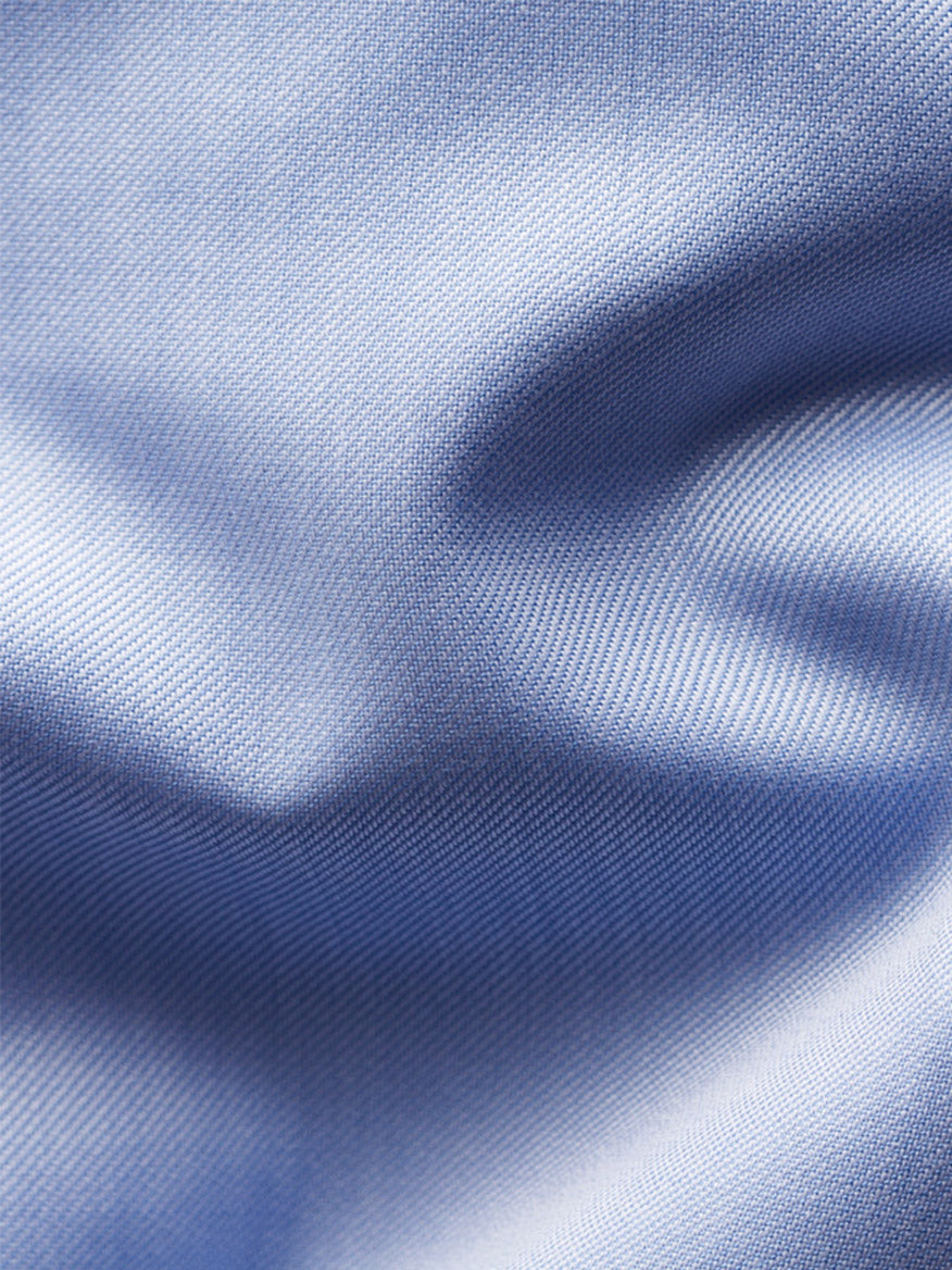 Close-up of the Eton Contemporary Fit Solid Signature Twill Dress Shirt in Light Blue – French Cuff, showcasing its distinctive twill weave and gentle fabric folds.
