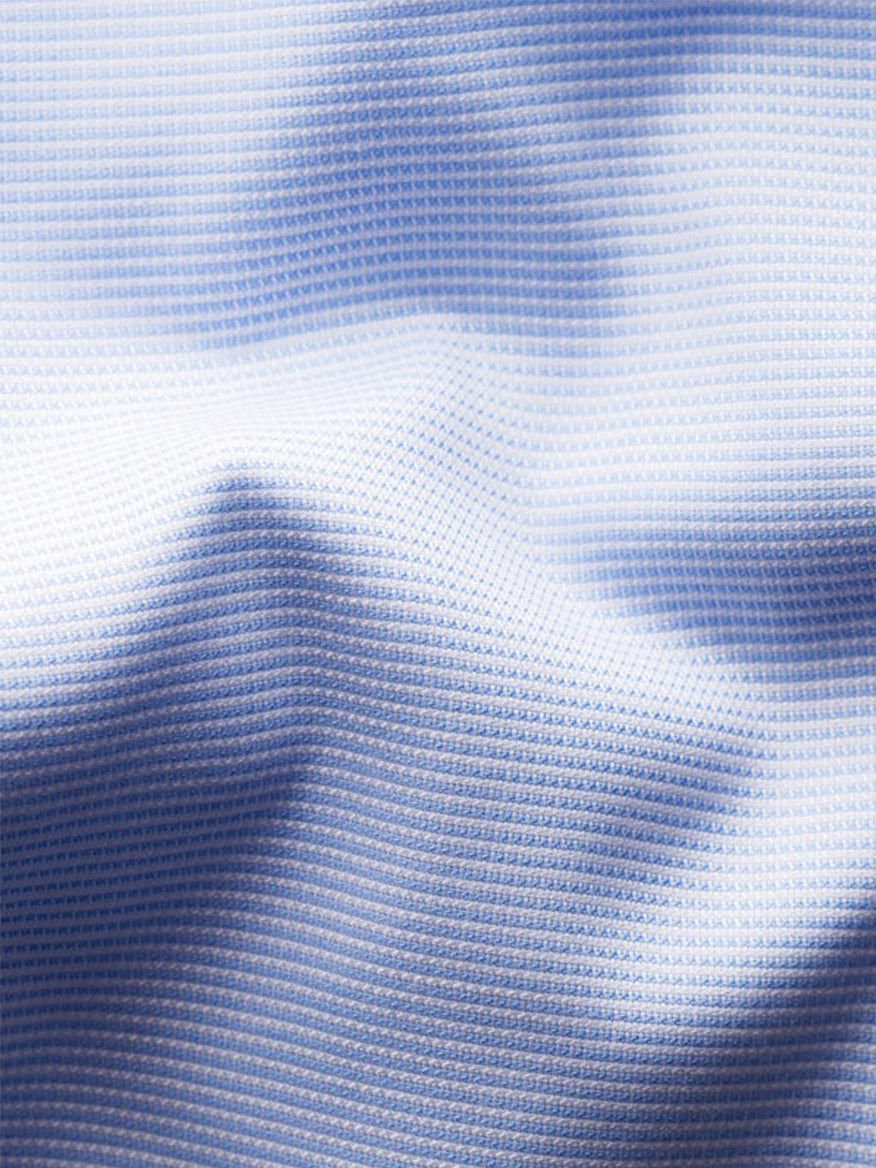 Close-up of the Eton Slim Fit Semi Solid Piping Details Shirt in Light Blue, featuring subtle grid-like texture and gentle folds—perfect for a cut away collar style.