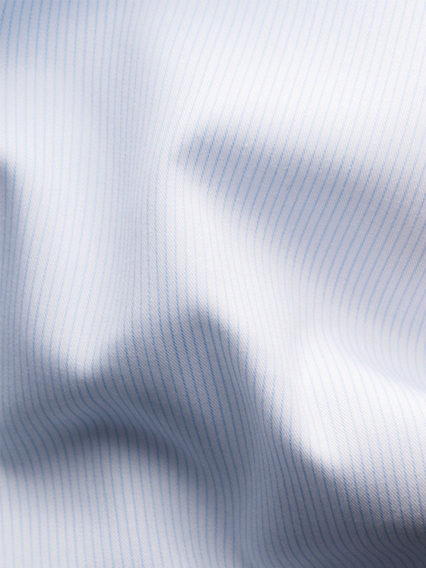 Close-up of the Eton Slim Fit Striped Twill Dress Shirt in Light Blue, featuring thin vertical stripes and a crease-resistant cotton twill—ideal for a sharp, polished look.