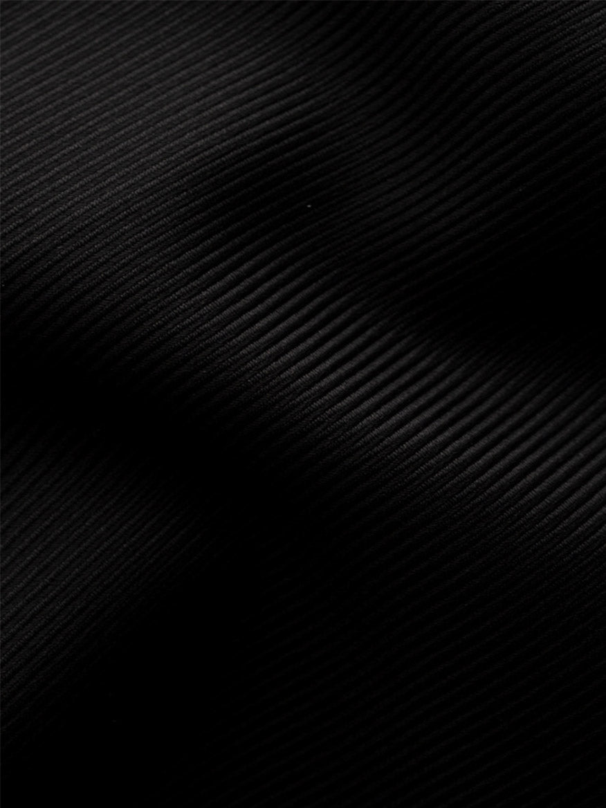 Close-up of the Eton Slim Fit Black Textured Twill Dress Shirt, showing its fine vertical ribbed texture and subtle sheen—perfect for refined business attire.