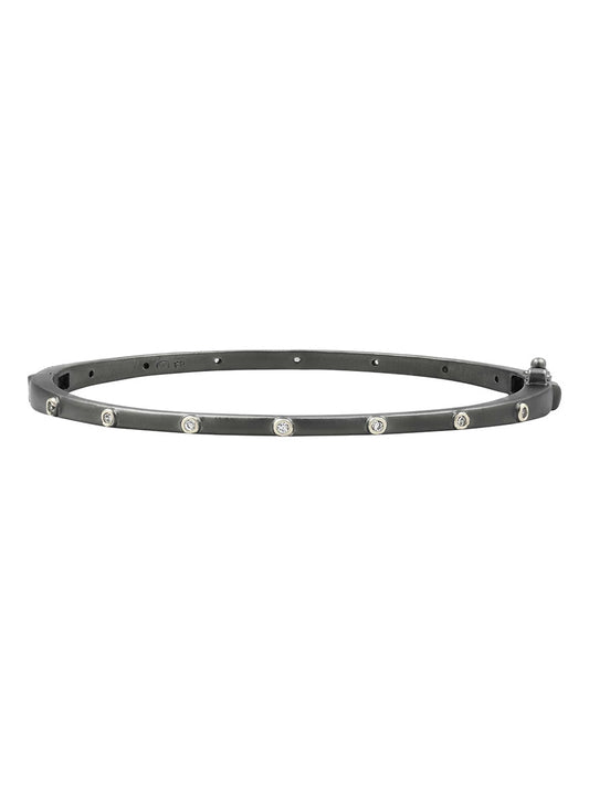 Freida Rothman Thin Bezel Stacking Bangle in Black & Silver with evenly spaced sterling silver studs and a buckle, displayed against a white background.