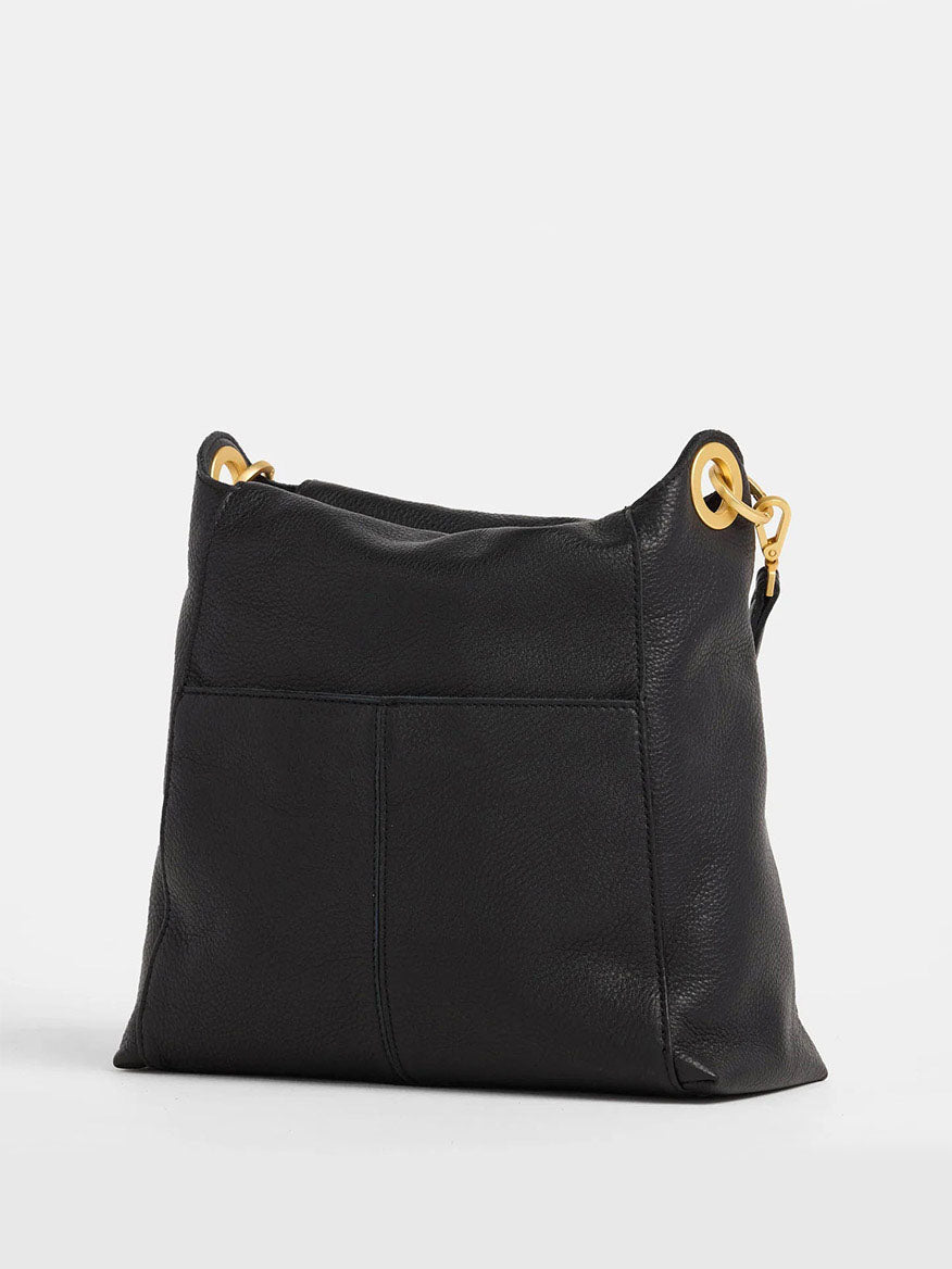 The Hammitt Los Angeles Bryant Large Crossbody Bag in Black & Brushed Gold features a soft black pebbled leather design with gold-tone metal accents, a simple front pocket, and a versatile crossbody strap.