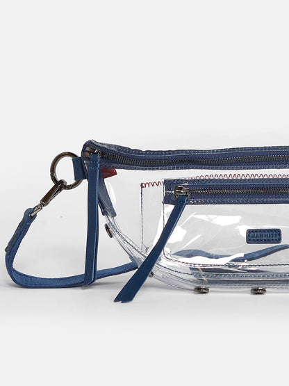 Hammitt Los Angeles Charles Crossbody Clear bag with blue zippers and accents, featuring a detachable strap, brand label, and stadium-approved crossbody styling in Vintage Navy.