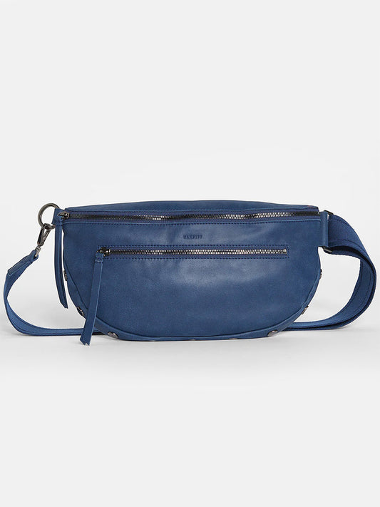A Hammitt Los Angeles Charles Crossbody Large in Vintage Navy with multiple zippers on a white background.