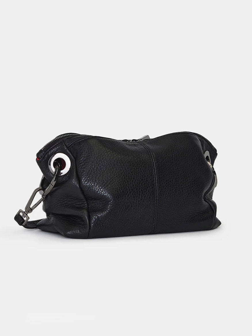 The Hammitt Los Angeles Daniel Crossbody Clutch Small in Black/Gunmetal features black pebbled leather, silver grommets, and a detachable metal clasp, displayed against a plain white background.