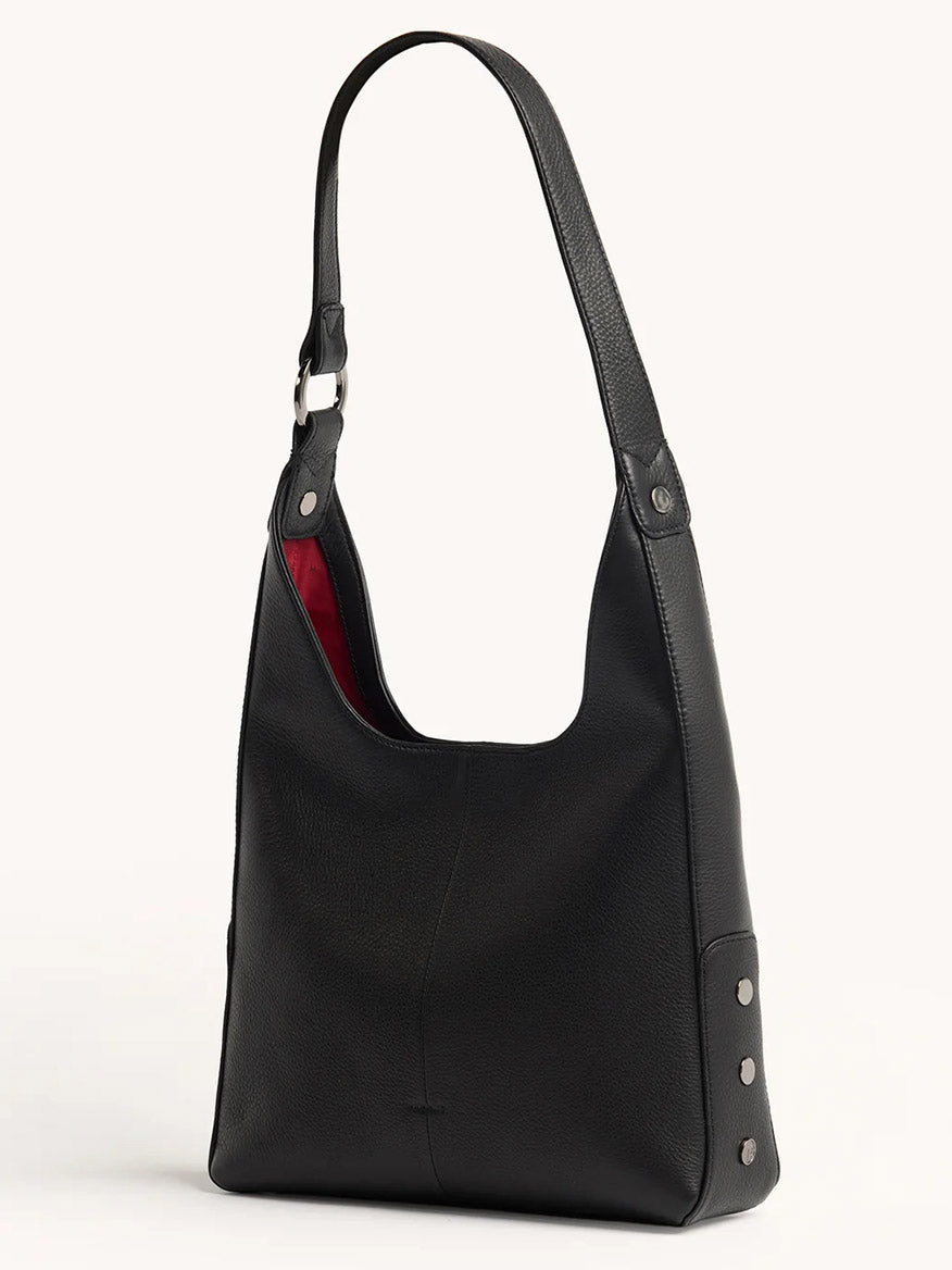 The Hammitt Los Angeles Tim Hobo in Black features pebbled leather, a wide strap, red lining, and metal stud side accents, displayed against a plain background.