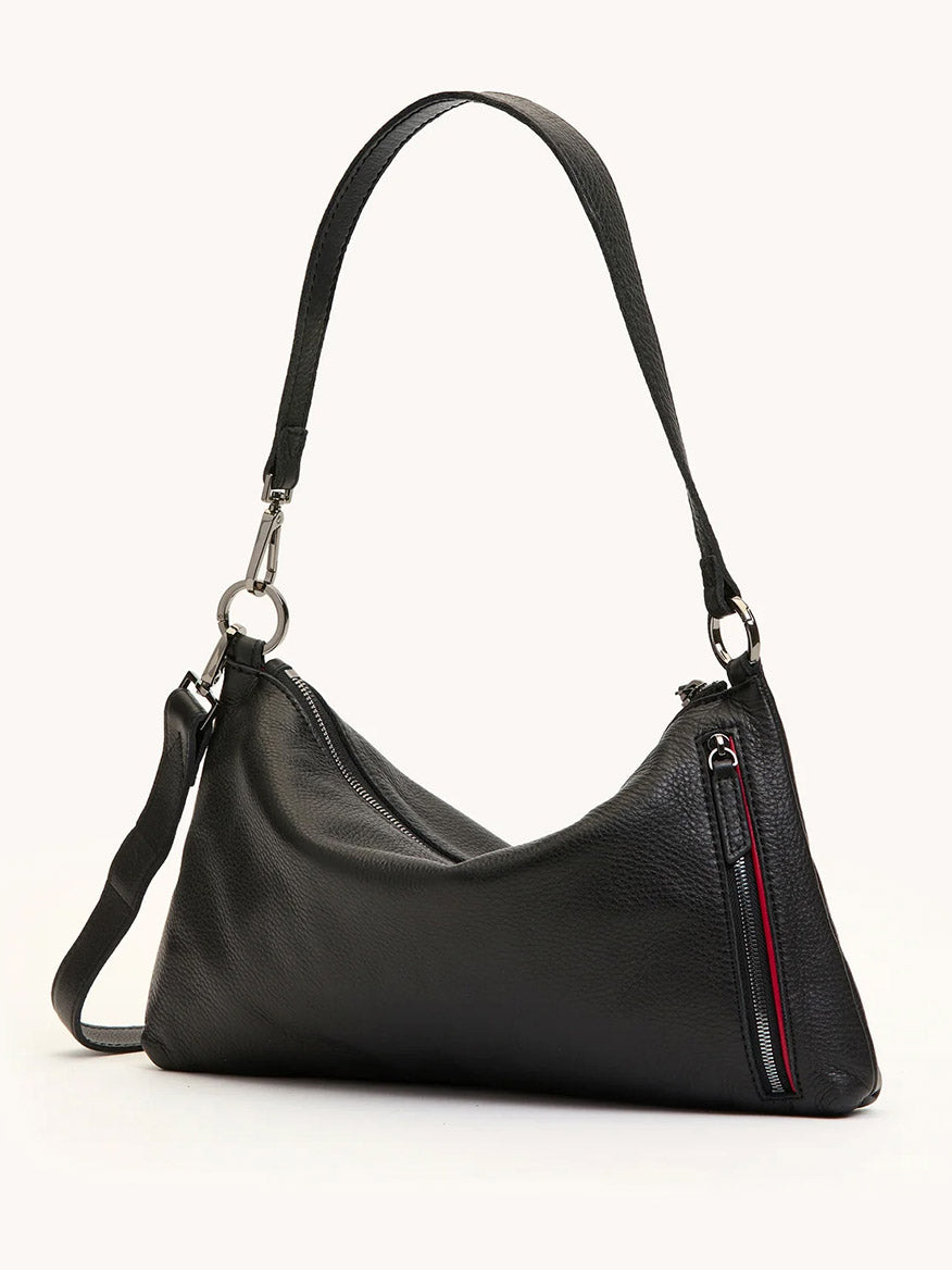 The Hammitt Los Angeles Kyle Medium Shoulder Bag in Black/Gunmetal features black pebble leather, a single adjustable strap, side zip pocket, and gunmetal hardware, shown against a plain light background.