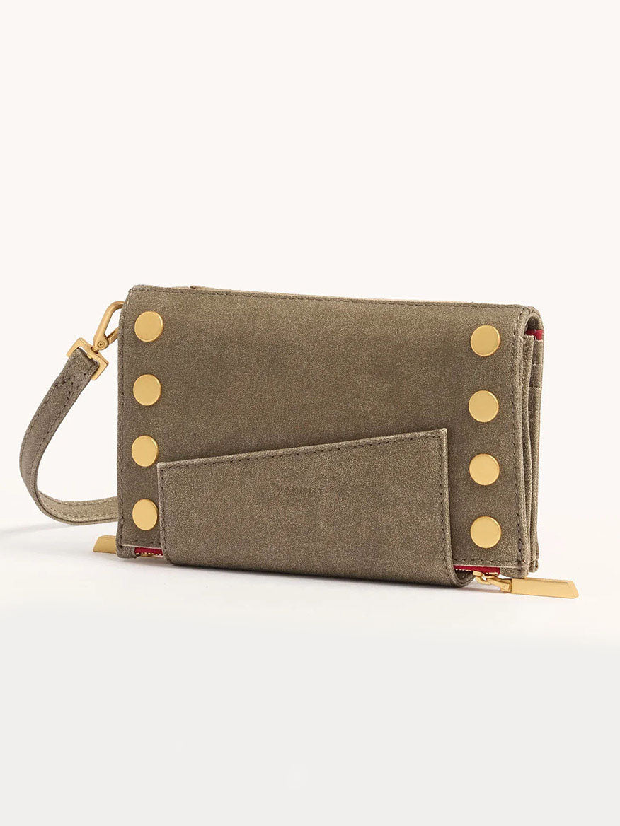 The Hammitt Los Angeles Levy Clutch in Pewter/Brushed Gold features a convertible design with a wrist strap, gold button accents, and an exterior pocket, shown against a plain light background.
