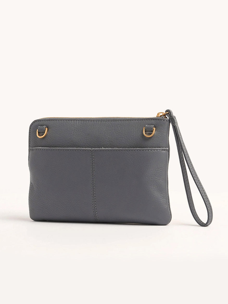 A Hammitt Los Angeles Nash Small Clutch in Sonnet Grey/Brushed Gold features pebbled leather, a front pocket, gold-tone hardware, and a detachable wrist strap, photographed on a plain light background.