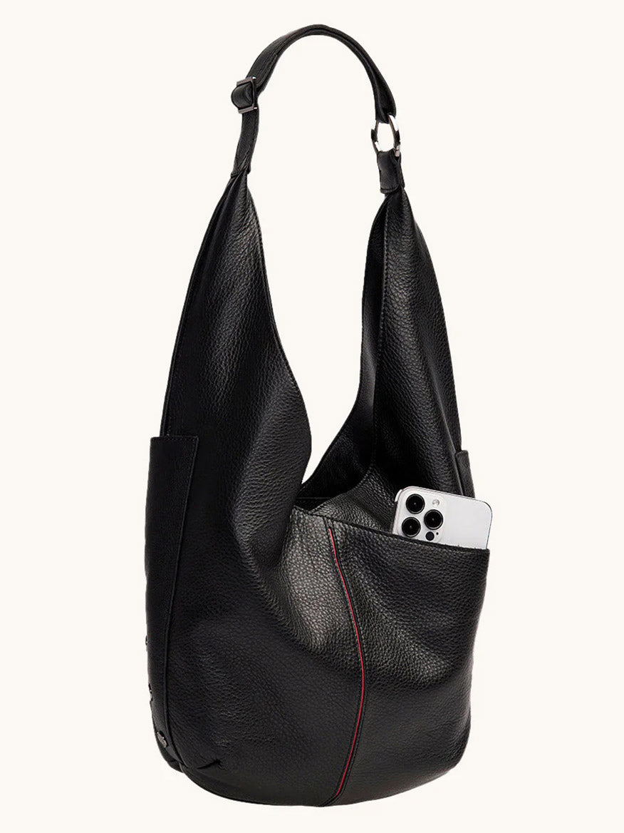 The Hammitt Los Angeles Tom Zip Large in Black/Gunmetal is a pebbled leather shoulder bag featuring an exterior pocket for your smartphone, a single wide strap, and subtle red stitching detail.