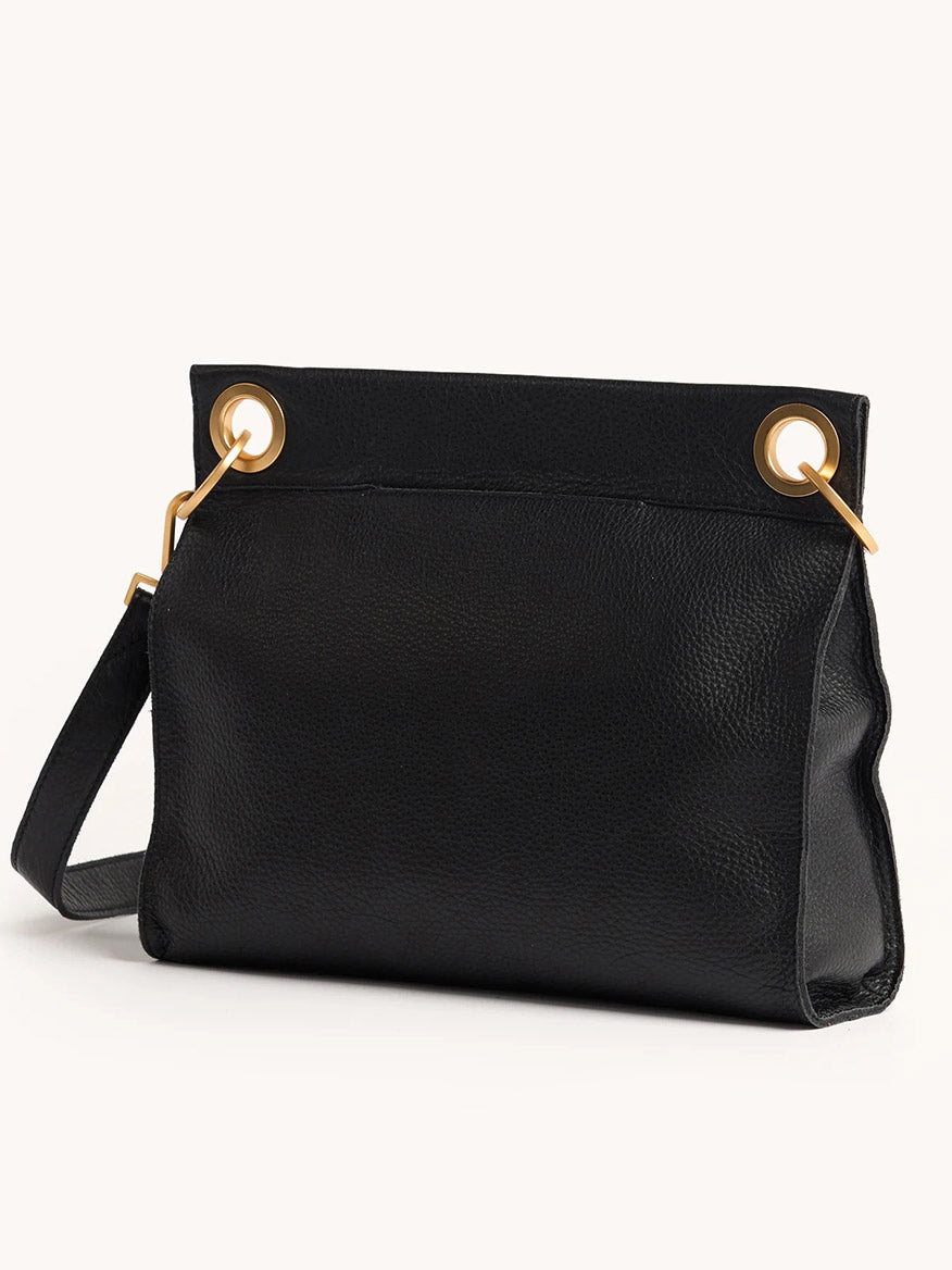 The Hammitt Los Angeles Tony Large Crossbody Bag in North End features black leather, gold-tone eyelets, and an adjustable, detachable strap, shown against a plain background.