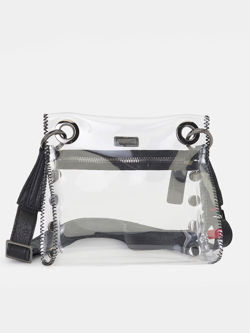 The Hammitt Los Angeles Tony Small Crossbody Bag in Clear Black/Gunmetal features black trim, visible stitching, metal grommets, and a detachable black strap, shown against a plain white background.