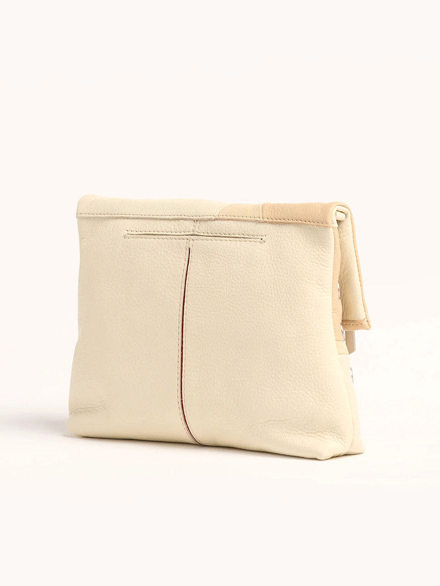 A Hammitt Los Angeles VIP Medium Clutch in Coastal Cream with brushed silver hardware, featuring visible stitching and a fold-over top, shown against a plain white background.