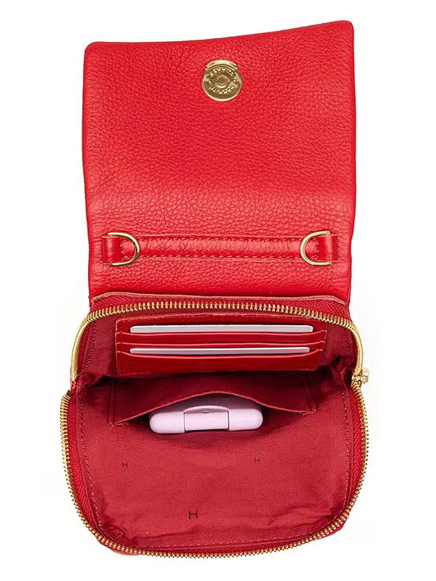 Open Hammitt Los Angeles VIP Mobile in Chili Red/Gold pebble leather wallet with gold zipper and snap, revealing card slots, a pink VIP Mobile electronic device, and fabric lining.