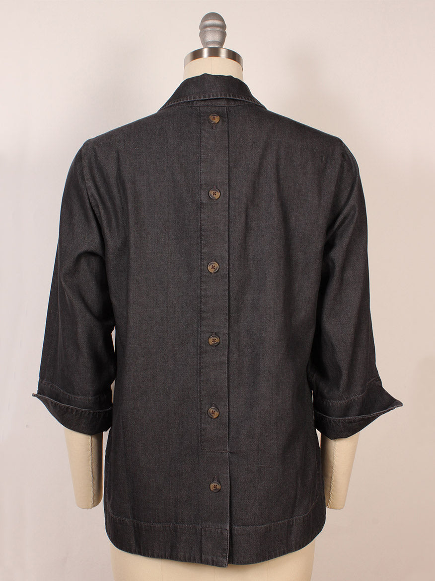 The Hinson Wu Aileen 3/4 Sleeve Denim Shirt in Black Wash is displayed on a mannequin from the back, featuring high-quality fabric and a center row of buttons.
