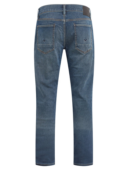 Pair of Hudson Blake Slim Straight Jeans in Riptide displayed from the back view.