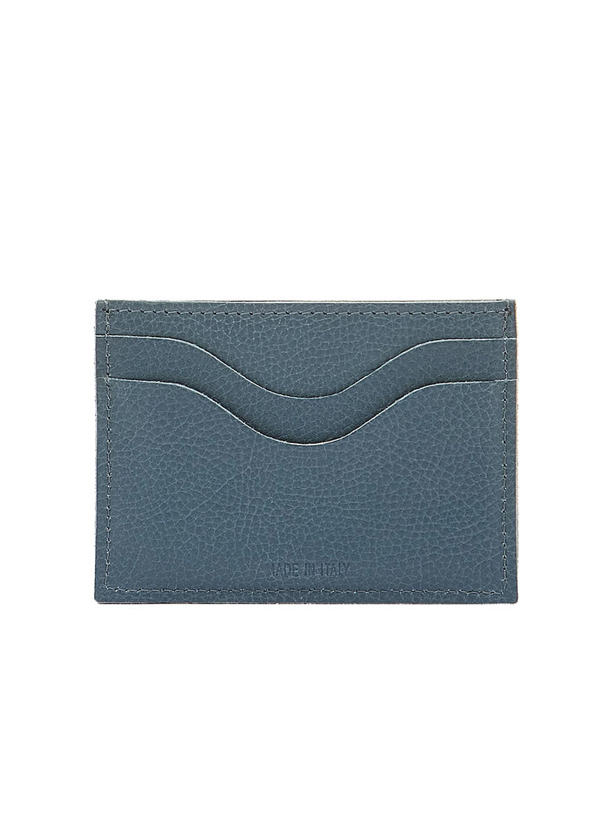 The Il Bisonte Salina Card Case in Blue Denim Leather is a minimalist card holder made from vegetable-tanned cowhide, featuring two front card slots. Crafted in Italy, it embodies elegance and functionality.