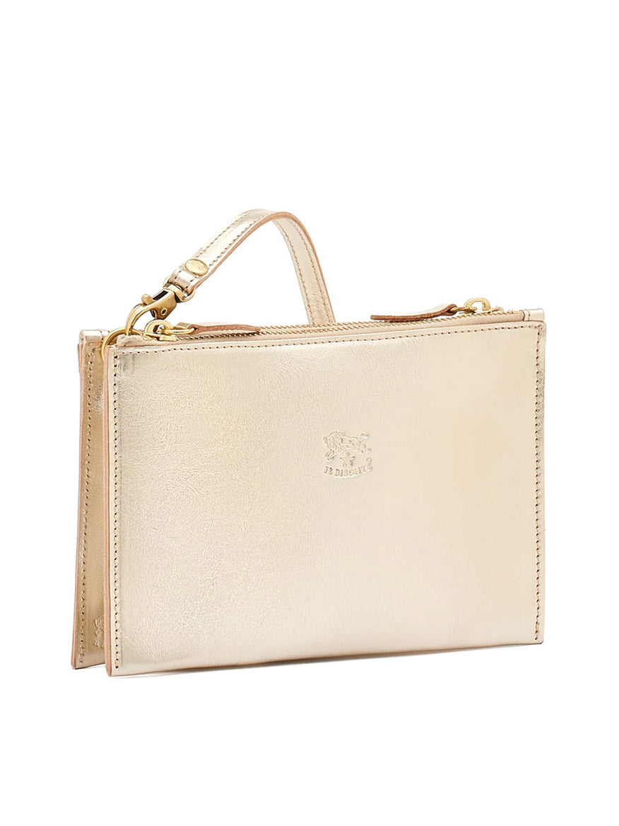 A Il Bisonte Talamone Clutch Crossbody Bag in Metallic Platinum Leather with a adjustable strap.