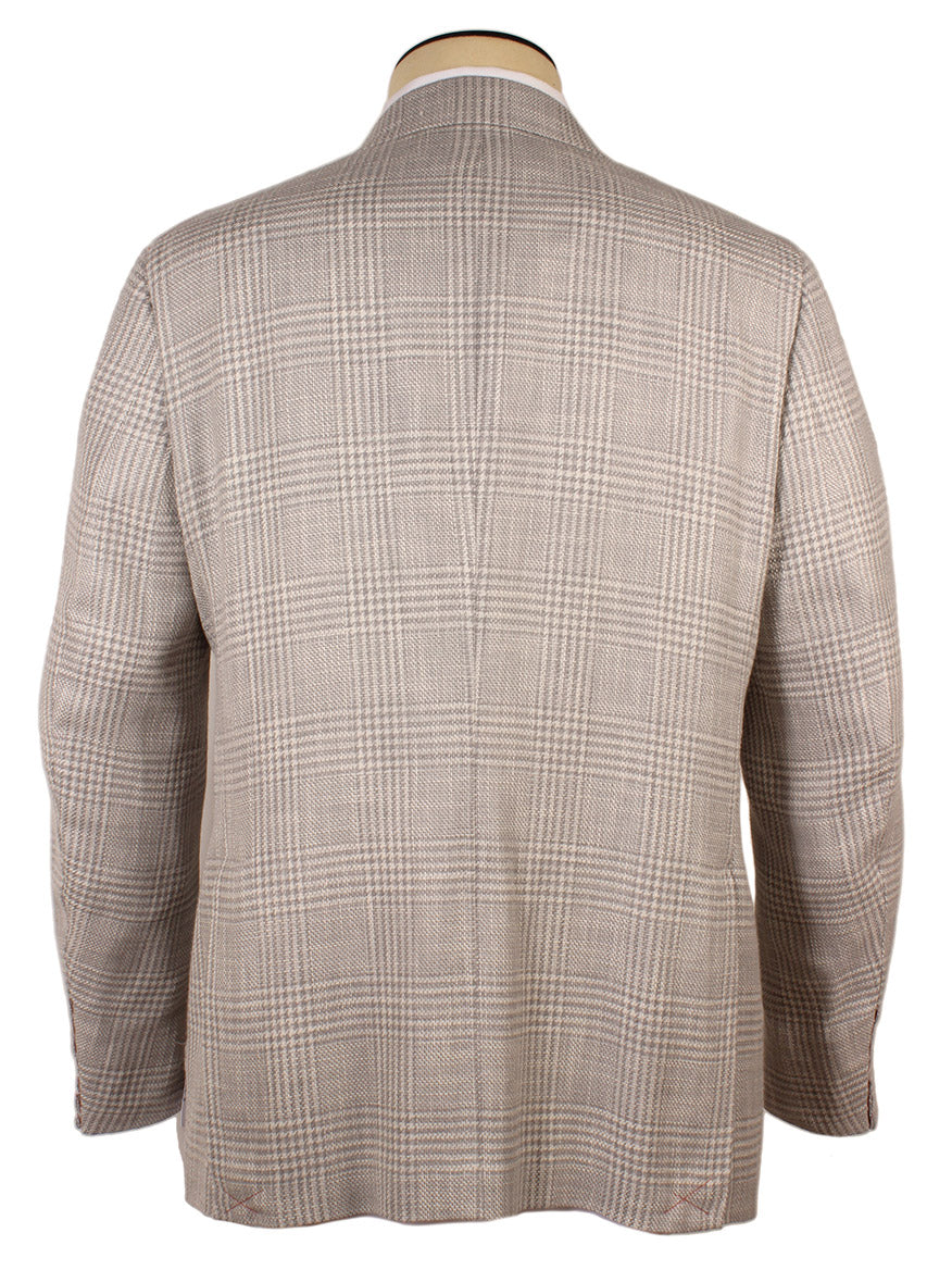 Displayed elegantly on a mannequin, the Isaia Capri Sport Jacket in cream Glenn plaid is crafted from a luxurious wool/silk blend in Italy, featuring structured shoulders and a subtle checkered pattern.