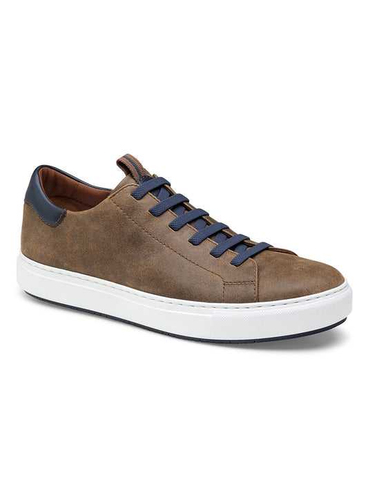 A single J & M Collection Anson Lace-to-Toe in Brown Full Grain sneaker with blue laces and a white sole, displayed on a light background.