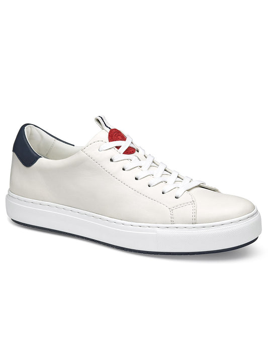 J & M Collection Anson Lace-to-Toe in White Sheepskin leather sneaker with a navy heel patch and red logo on the tongue, displayed against a white background.