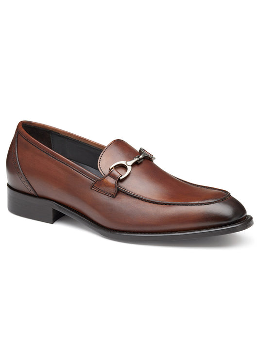 A J & M Collection Ellsworth Bit in Brown Italian Calfskin crafted from Italian calfskin, featuring a metal buckle detail on the front, enhanced cushioning for added comfort, and a low heel.
