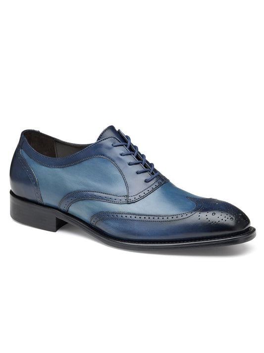 A J & M Collection Ellsworth Wingtip in Navy Italian Calfskin dress shoe with brogue detailing and black accents, crafted in Italy.