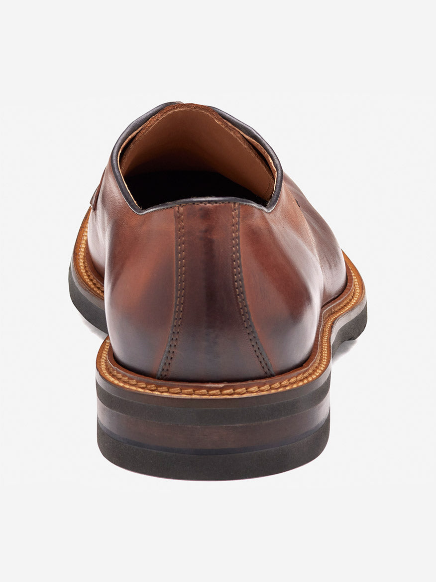 Rear view of the J & M Collection Hartford Plain Toe in Tan Italian Calfskin, featuring stitching detail and a layered Vibram EVA sole, shown against a plain white background.