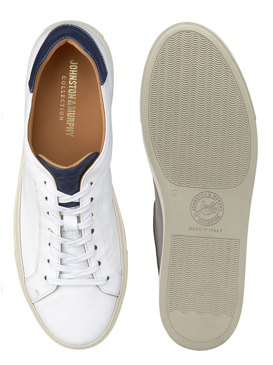 A pair of J & M Collection Jared Lace-To-Toe in White Italian Calfskin sneakers with leather lining displayed from a top and bottom view, showing the design and tread pattern.
