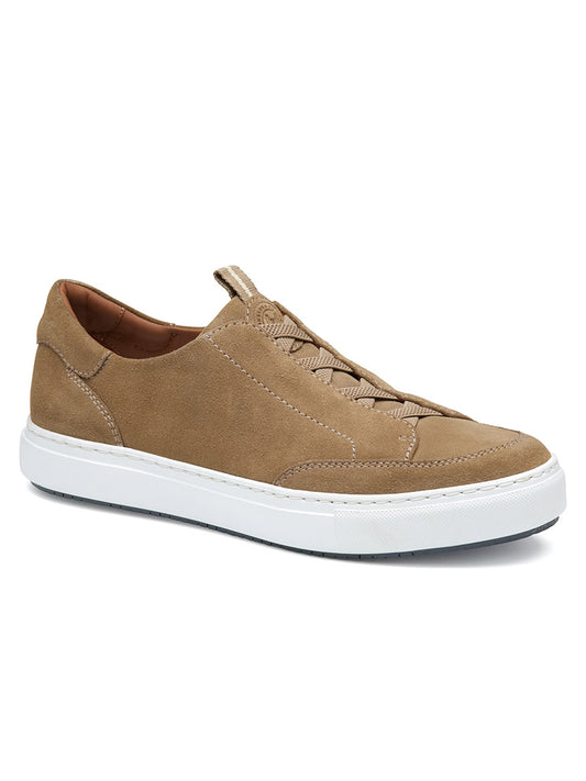 The J & M Collection Anson Stretch Lace-to-Toe sneaker in Taupe English Suede features an all-suede design with a white rubber sole, a lace-up front, and a cushioned leather-covered footbed for enhanced comfort.