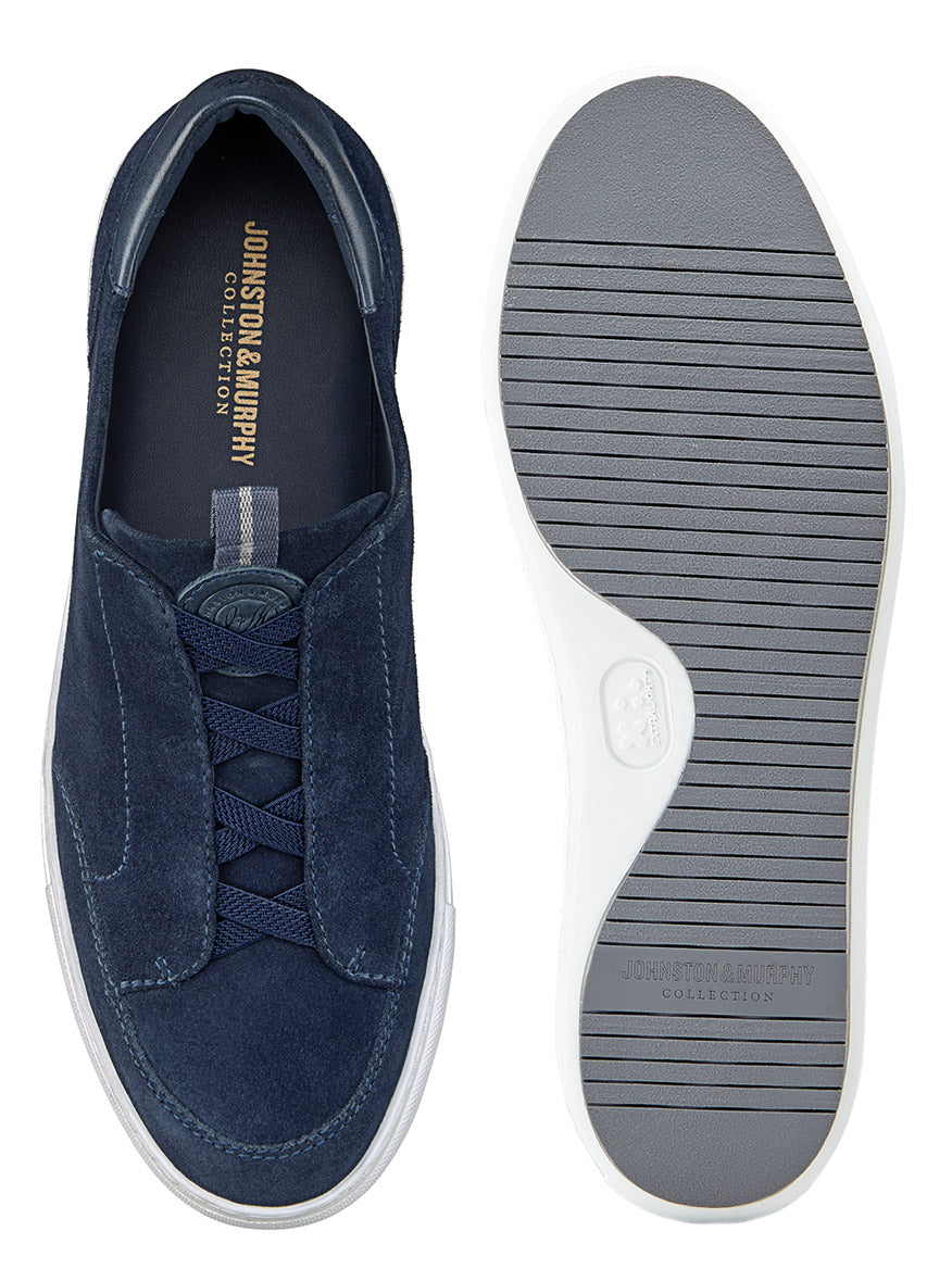 Top and bottom views of the J & M Collection Anson Stretch Lace-to-Toe in Navy English Suede showcase navy suede sneakers with a cushioned footbed, white stitching, rubber sole, lace-up design, and textured sole for traction.