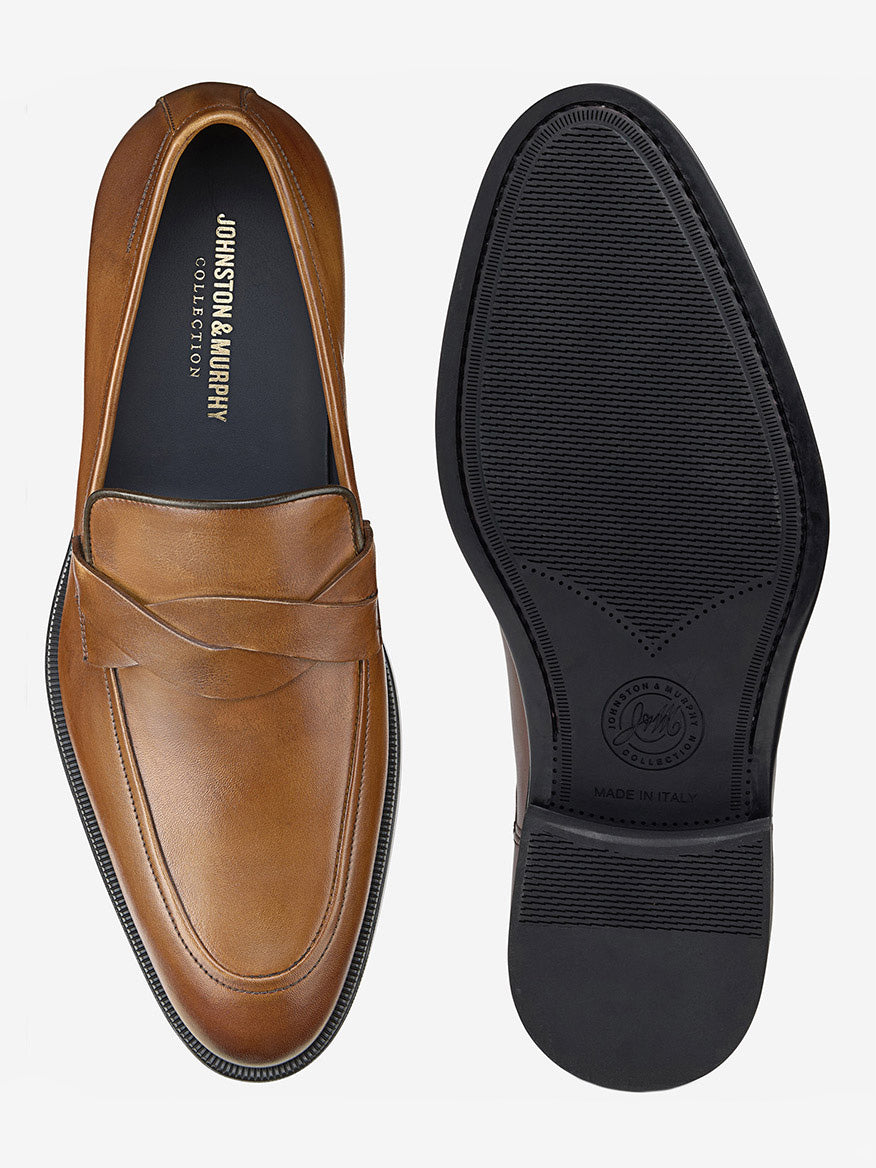 The J & M Collection Flynch Loafers in Tan Italian Calfskin feature a braided strap, smooth upper, and black rubber sole with textured grip and branding, making them the perfect versatile dress shoe.