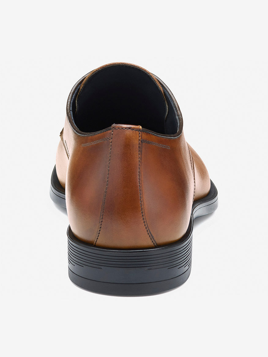 Rear view of the J & M Collection Flynch Plain Toe in Tan Italian Calfskin dress shoe, featuring a black sole and subtle stitching for ultimate comfort.