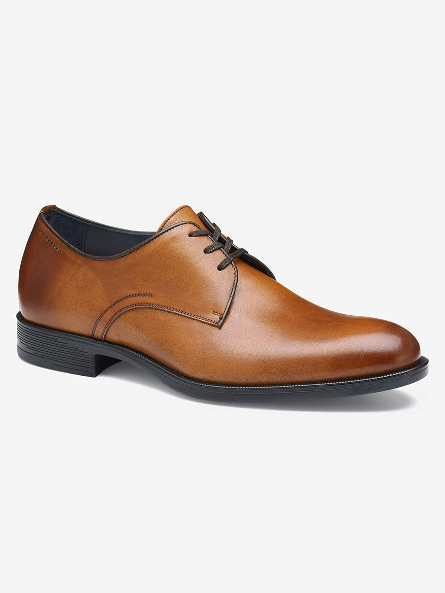 The J & M Collection Flynch Plain Toe in Tan Italian Calfskin is an elegant leather dress shoe with black laces and a low heel, showcased on a plain white background.