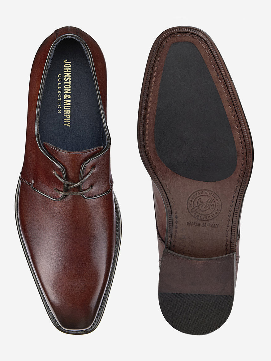 The J & M Collection Larson 2-Eye Plain Toe in Mahogany Italian Calfskin is shown from top and bottom. The top view showcases laces on a handcrafted shoe, while the sole displays branding and "Made in Italy" text.