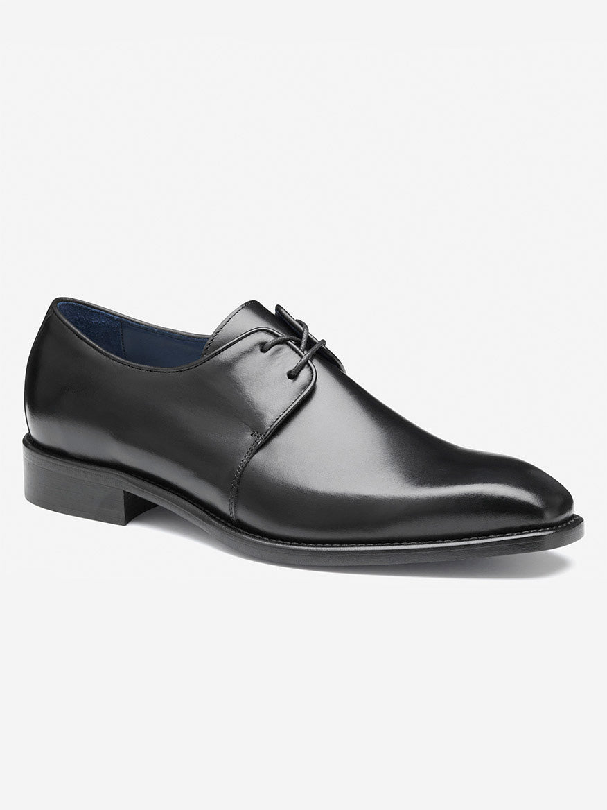 The J & M Collection Larson 2-Eye Plain Toe features handcrafted black leather, a lace-up design, low heel, and smooth finish in luxurious Italian calfskin against a plain white background.